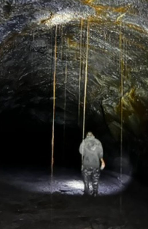 Walking deeper into the lava tube by flashlight